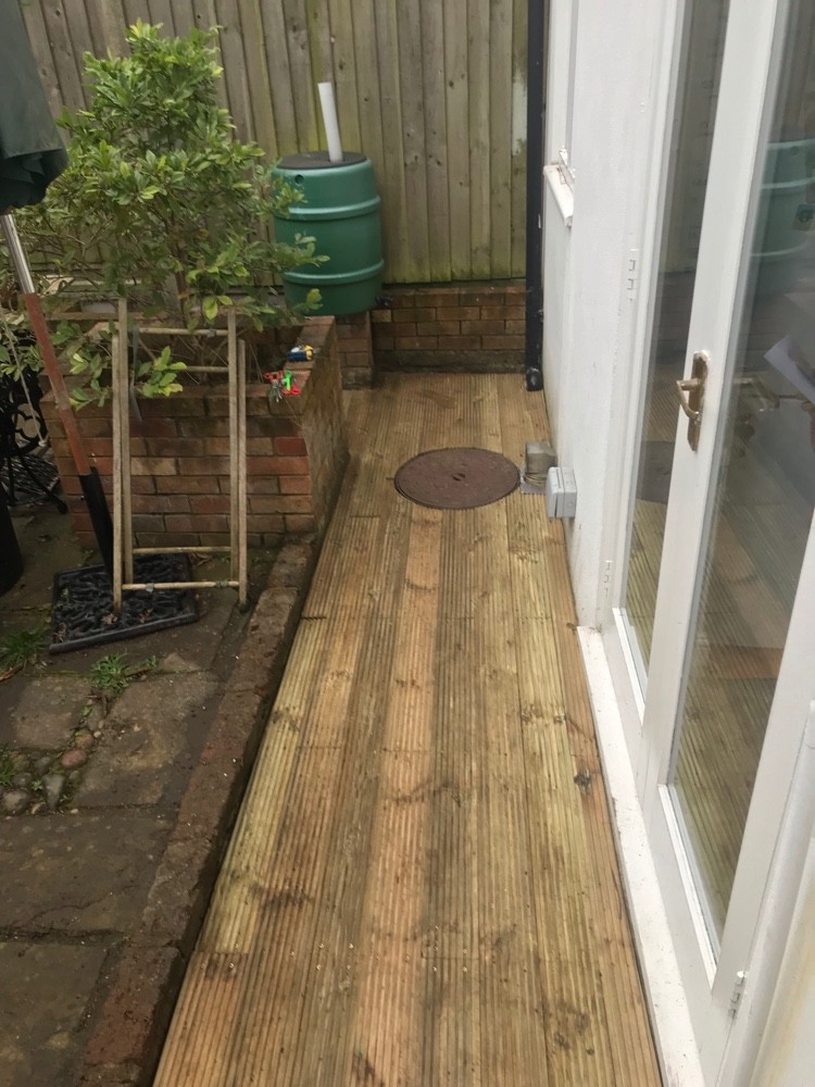 Timber decking walkway installed in a London garden