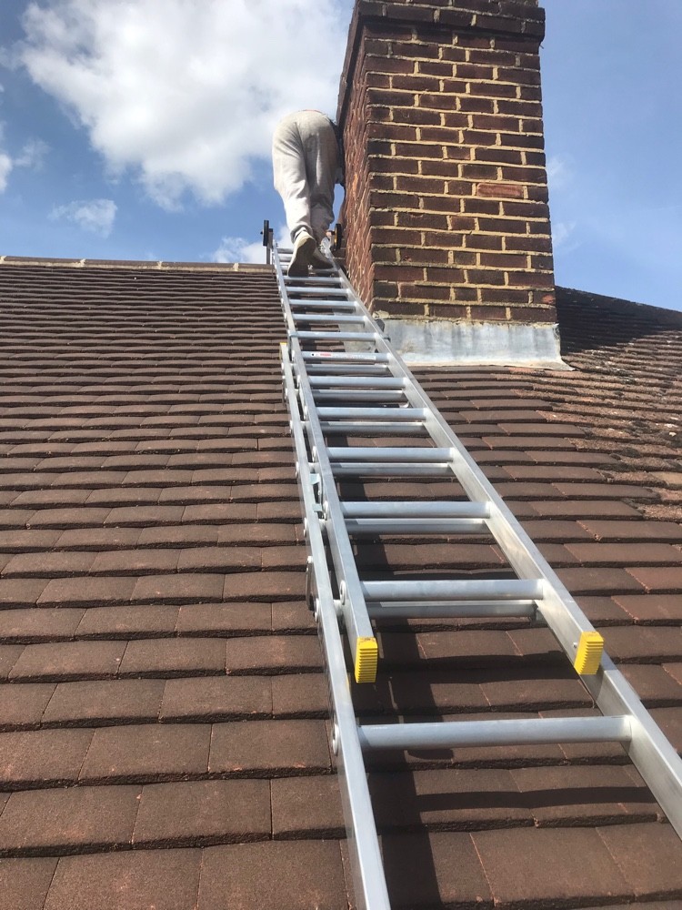 Roof ladder access to chimney for repairs