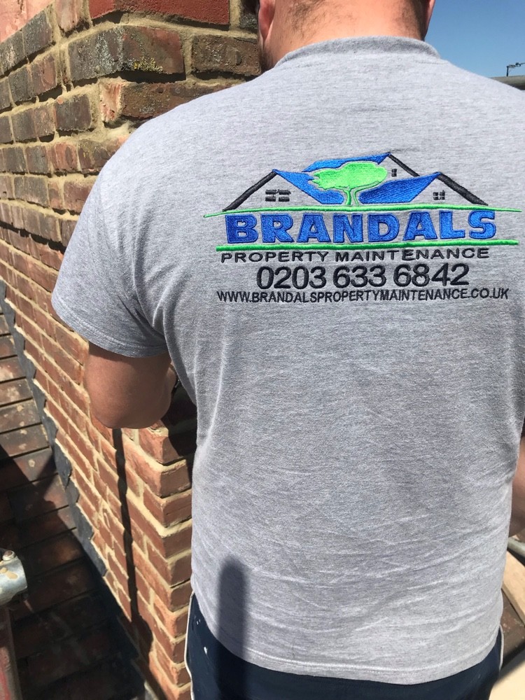Brandals Property Maintenance team member on a roofing job